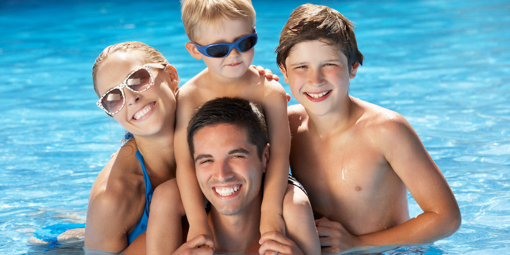 family having fun - swimming pool safety