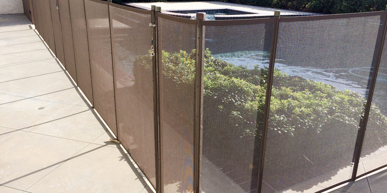 Safety fence at swimmimg pool pool safety fence in Texas - Baby Barrier installation
