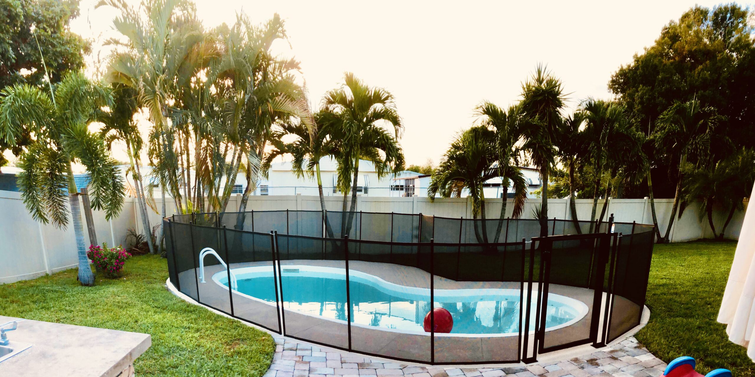 Baby Barrier pool safety fence on Florida Gulf Coast home