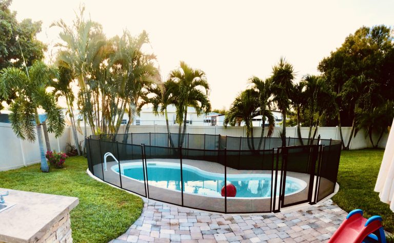 Baby Barrier pool safety fence on Florida Gulf Coast home