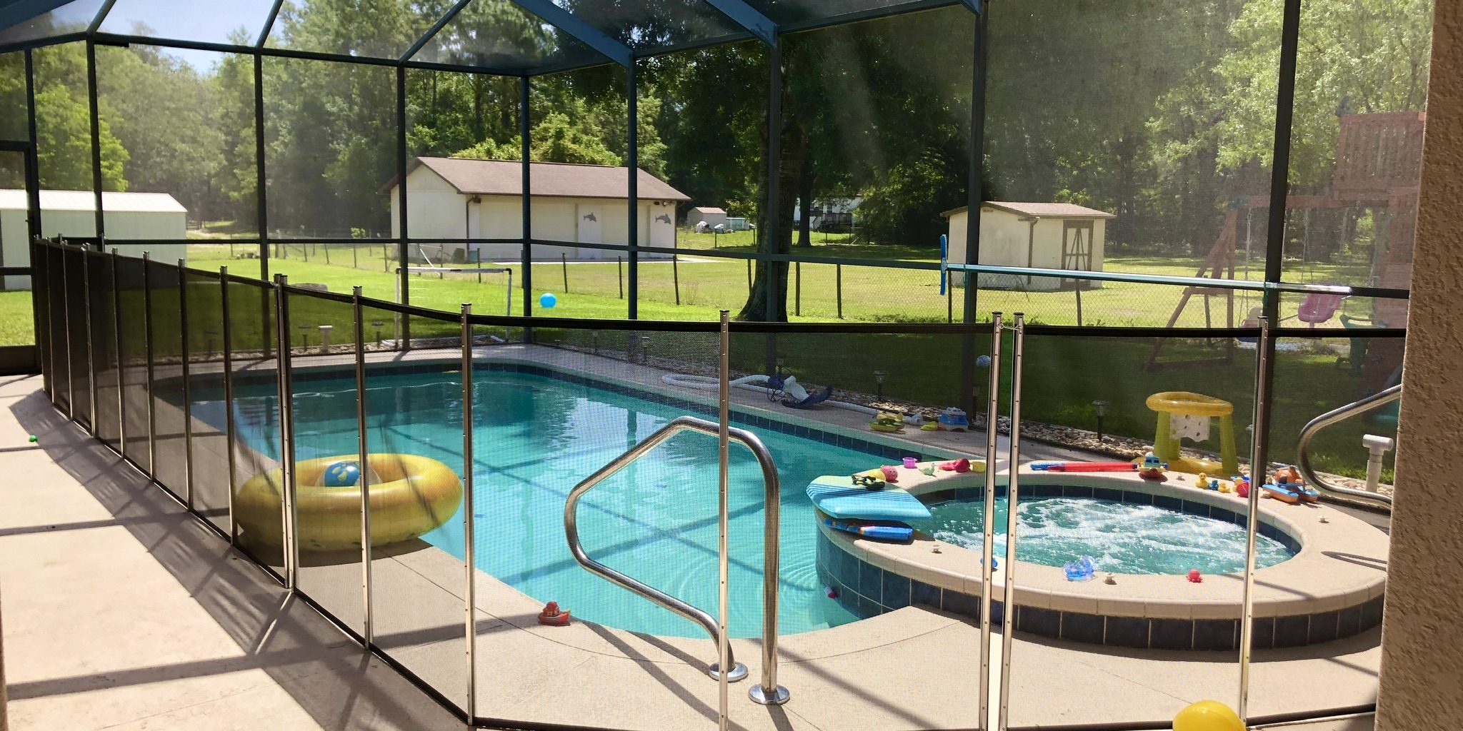 Baby Barrier removable pool safety fence installed at a Southwest Florida home