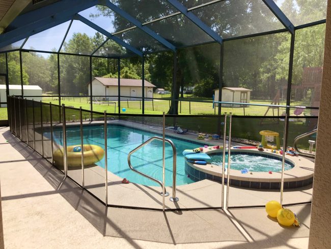 Baby Barrier removable pool safety fence installed at a Southwest Florida home